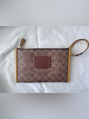 Coach Brown Signature Canvas Wristlet with orange gold Trim